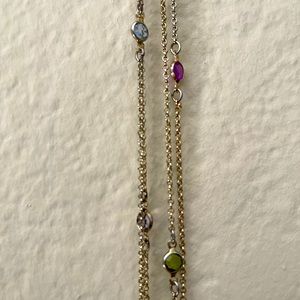 Gold chain necklace with gems